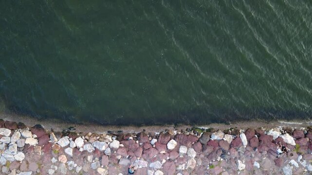 Waves Touching Stones