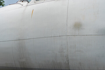 Close-up view of a worn, aged aircraft engine on the fuselage of a passenger jet Realistic...