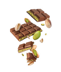 Dubai chocolate with pistachios in the air isolated on white background