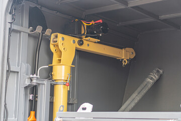 Interior view of a rescue vehicle, dominated by industrial metal structures and a large...