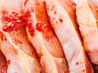 Fine pork chops in rich red juicy marinade. Raw meat product for cooking in many different way....