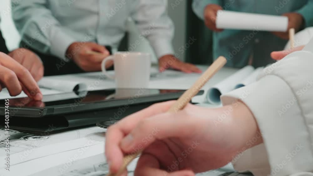 Poster a dynamic office meeting scene showing hands engaged in discussion around a table. team members anal