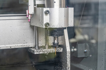 Close-up of worn industrial machine metallic, levers, gears, hydraulicspneumatics in factory...