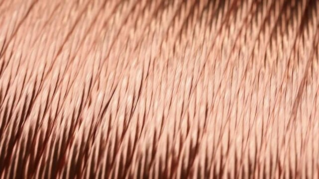 Close-up Texture of Copper Wire Coil, Detailed Macro Photography