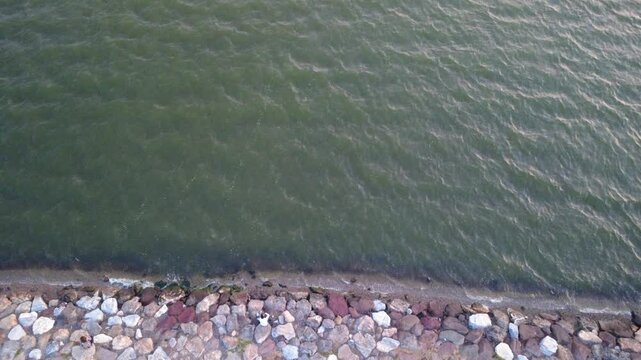 Waves Touching Stones