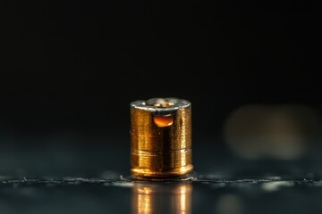 Macro shot capturing a burning fuse against a contrasting black background, A macro shot of a burning fuse in front of a black background