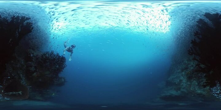 VR 360 Underwater panorama of the freediver swimming in the sea on a breath hold