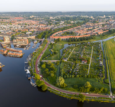 Aerial image of Dutch rural road where bicyclists have priority over cars, sustainable healthy mobility concept