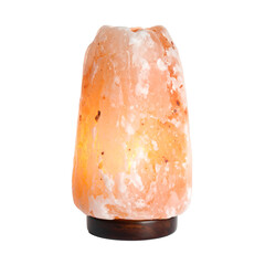 Himalayan pink salt lamp on wood base isolated on transparent background