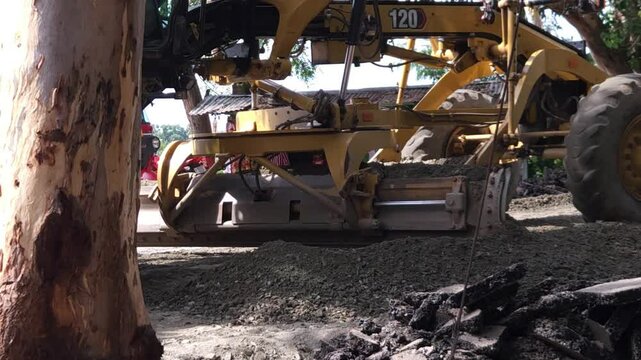 Busy construction site India. Heavy equipment and industrial machinery like bulldozer, compactor, pavers work on road and highway development, complete street maintenance for urban infrastructure