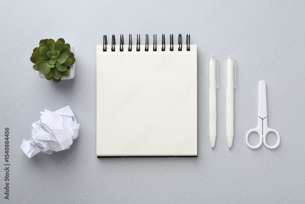Aufkleber flat lay composition with notebook on gray background