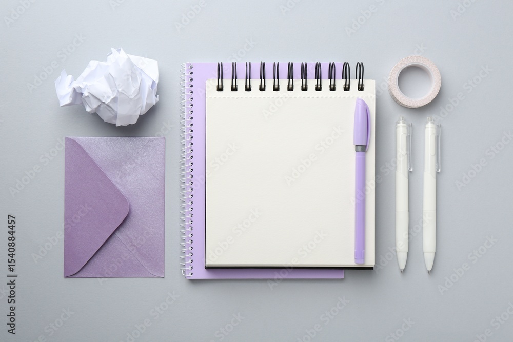 Aufkleber flat lay composition with notebook on gray background