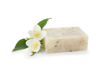 Soap bar and jasmine flowers isolated on white