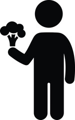 A silhouette figure holding fresh broccoli representing healthy eating and wellness lifestyle