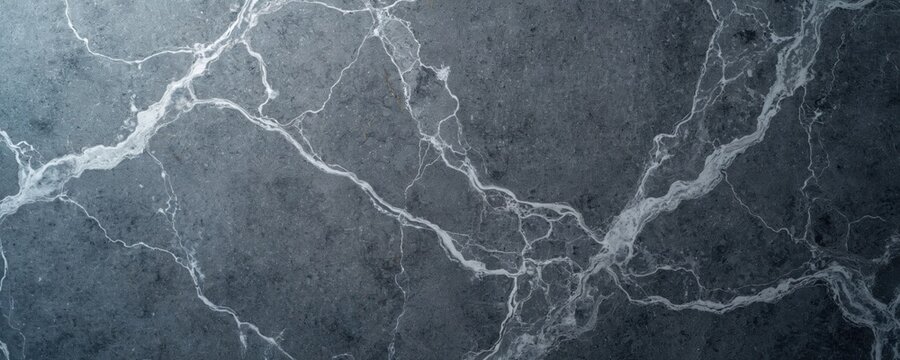 Gray marble granite stone texture background banner panorama. Dark grey stone surface, elegant pattern. Natural seamless tile structure for kitchen, bathroom, floor, wall. Luxury abstract smooth