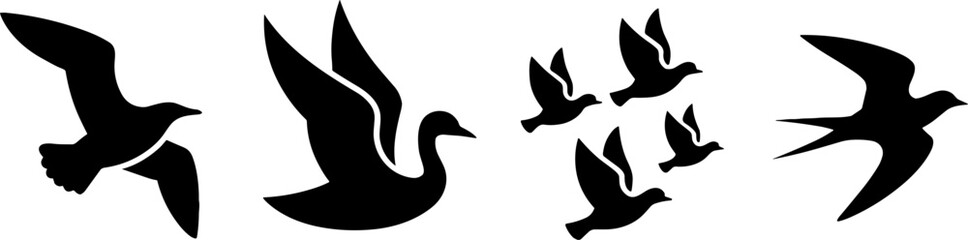 Obraz premium Flying Bird Silhouettes Group Set Wildlife Flocks