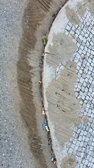 Sandy Sidewalk with Shoe Prints and Asphalt – Urban Ground Texture
