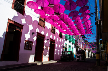 Colorful umbrellas and the beautiful streets of the Heritage Town of Jerico located in the Department of Antioquia in Colombia.