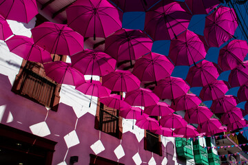Colorful umbrellas at the beautiful streets of the Heritage Town of Jerico located in the Department of Antioquia in Colombia.