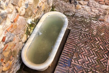 Ancient Bath Tub Flowing Water Well Fountain, Alcazaba Fortress Mediterranean Fortification, Famous Gibralfaro Castle Walled Corridor Malaga Spain