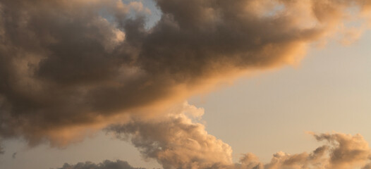 Beautiful sunset sky, with clouds, after rain. Evening sky background.