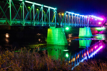 River Lights Bridge Illuminated at Night in Eau Claire