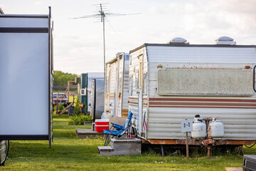 Campground with Campers on Green Field