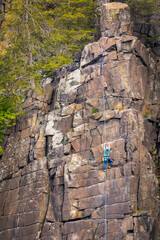 Solo Rock Climber on Stiff Rock