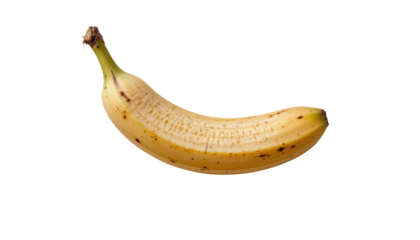 a yellow fruit is displayed against a stark, black background. the curved fruit shows some small, brown spots along its peel. the very tip of the fruit has a stem