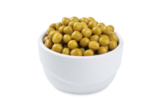 Canned green peas in a white bowl on a white isolated background