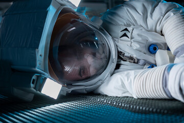 Astronaut losing life in accident onboard space station after sudden system failure during routine...