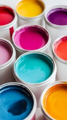 Fototapeta premium Bright Assortment of Colorful Paints in White Cans Vivid Hue CloseUp View