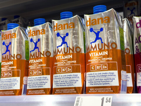 Ljubljana, Slovenia - June 03, 2025: Dana Muno vitamin drink cartons in a supermarket shelf, showcasing vibrant packaging and nutritional benefits for health-conscious consumers