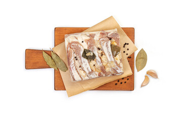 Traditional salted pork fat with spices isolated on white background