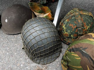 Naklejka premium Vintage Military Helmets on Display for Collectors