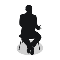 Lecturer gives a lecture into a microphone, black silhouette of a man sitting