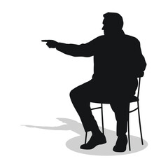 Man sits on a chair, a person points with his index finger in a direction to the side