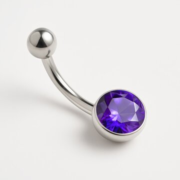Elegant belly button ring with a round purple gemstone in a silver curved barbell design, displayed on a white background.