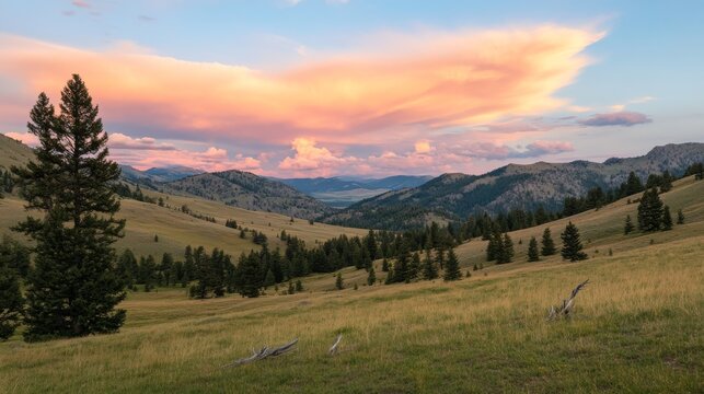 Golden hour sunset with vibrant blue and orange clouds over Montana's expansive big sky landscape