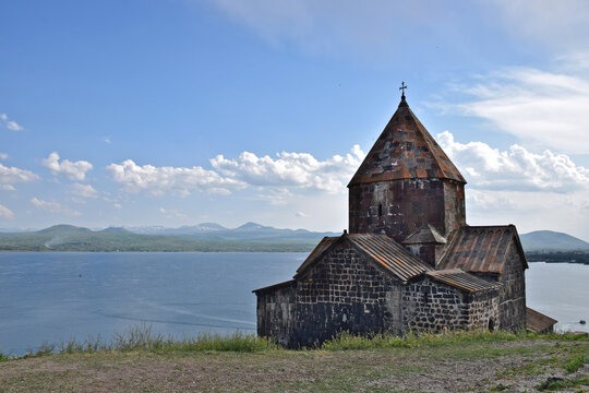 Sevanavank Monastery with Lake Sevan in the background &ndash; a striking scene where history meets natural beauty on the peninsula.