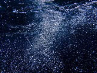 Air bubbles underwater rising to water surface, natural scene, bubbles under water, bubble...
