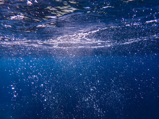 Air bubbles underwater rising to water surface, natural scene, bubbles under water, bubble...