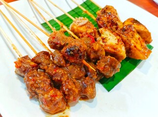 Savory Indonesian Satay: Grilled Meat and Tofu Skewers