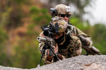 Special Forces Soldiers Armed and Ready During Tactical Training – Focused Military Men in...