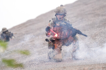Special Forces Soldier Standing in Smoke During Tactical Operation – Full Combat Gear with Rifle...