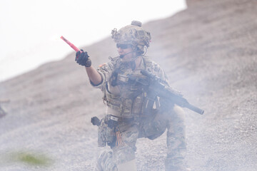 Special Forces Soldier Standing in Smoke During Tactical Operation – Full Combat Gear with Rifle...