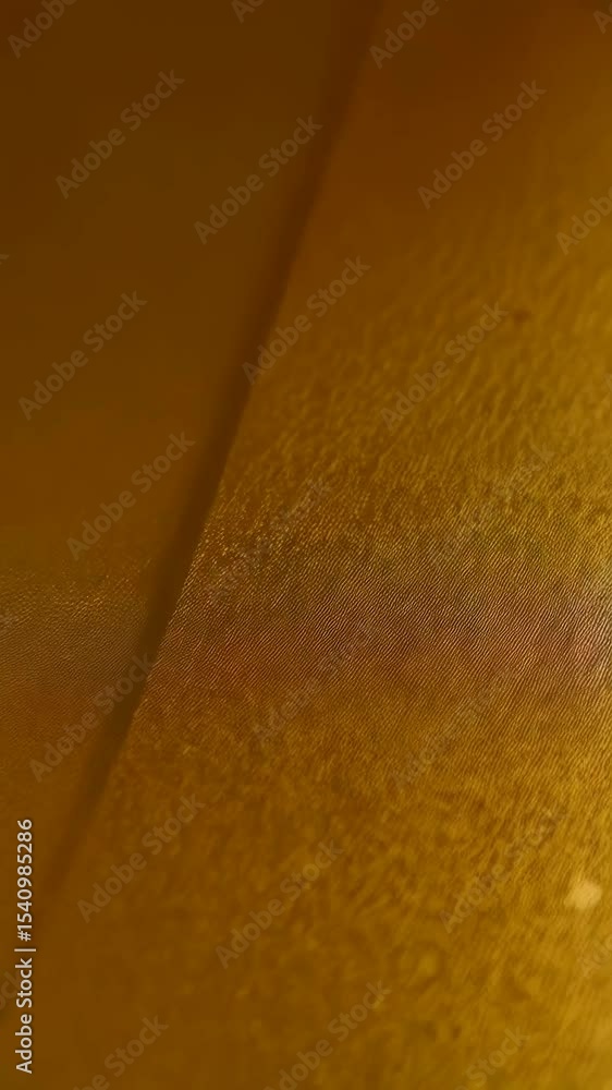 Poster abstract background with shiny gold layered surfaces creating interesting geometric shapes and warm 