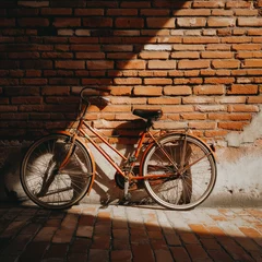 Fototapete old bicycle on a brick wall © Ahsan