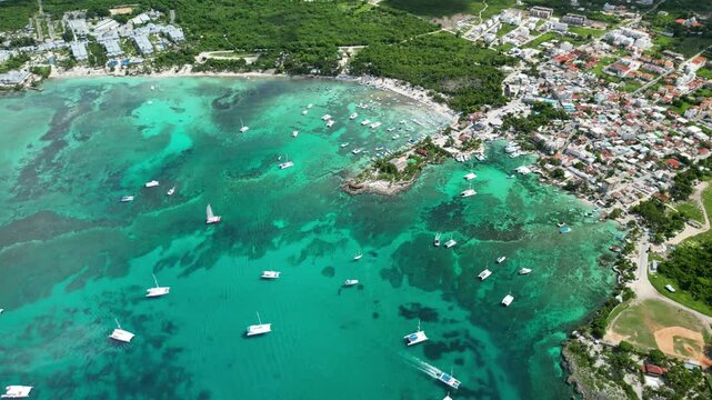 Panoramic shot of Bayahibe&rsquo;s bay with boats, clear water, and lush tropical vegetation.Filmed 14 November 2024