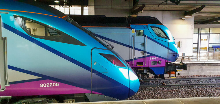 Two Trans-pennine express (TPE) trains lines up at Manchester Victoria rail station on the main line to Leeds which will form part of the governments Norther Power house initiative